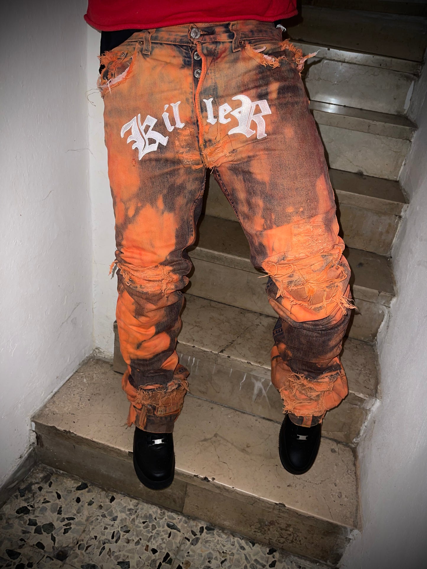 AFTERLIFE ARANCIO KILLER SNAKE JEANS