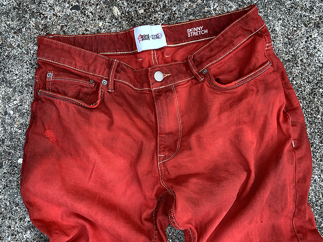 “DYED RED JEANS”