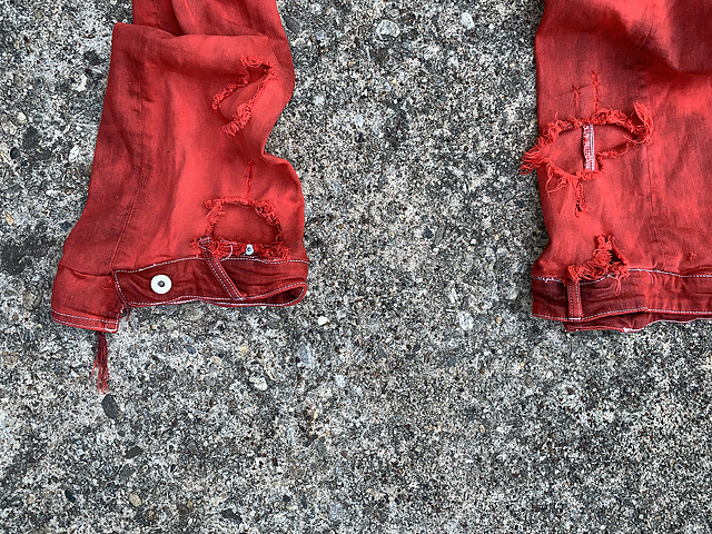 “DYED RED JEANS”